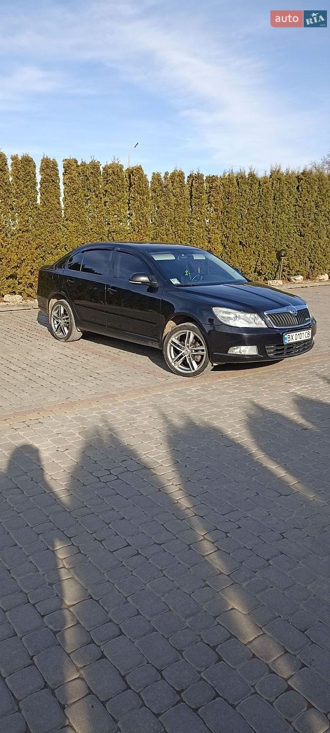 Skoda Octavia 2011 VIN TMBBK41Z7CB153751 фото оголошення 12 з 19