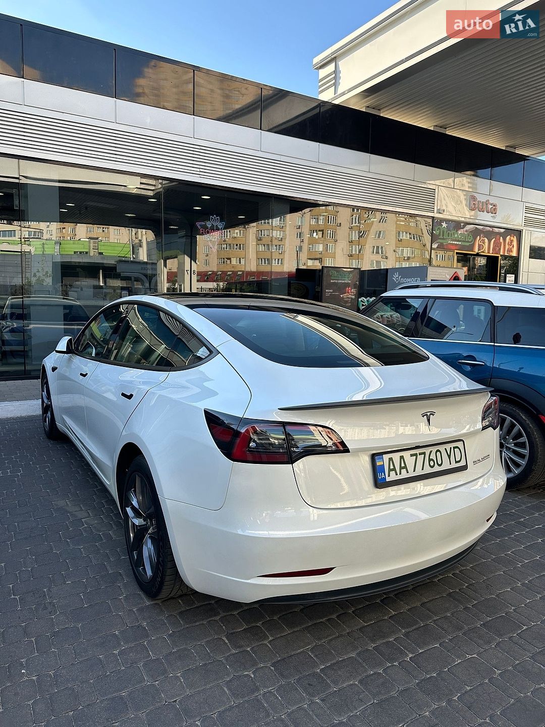 Tesla Model 3 2023 VIN 5YJ3E1EC1PF603879 фото оголошення 4 з 7