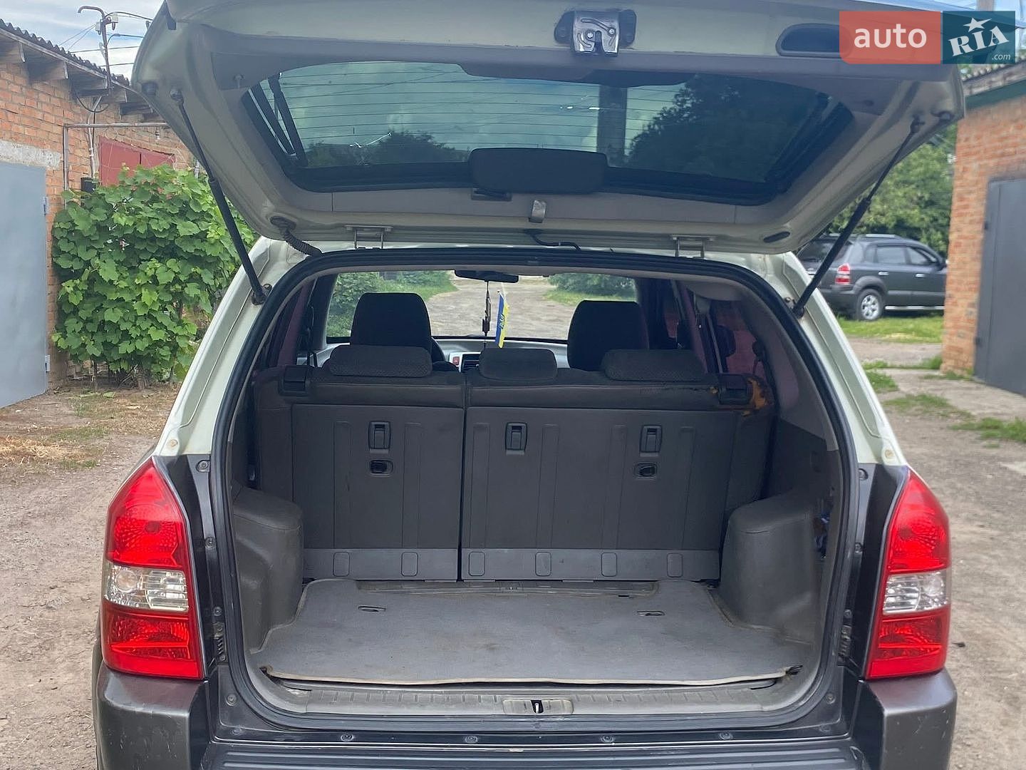 Hyundai Tucson 2005 VIN KMHJN81BP6U268100 фото оголошення 5 з 9