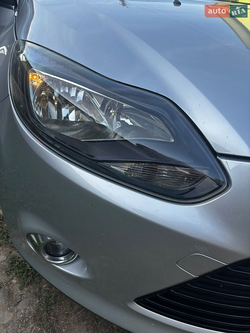 Ford Focus 2011 VIN WF0KXXGCBKBK67103 фото оголошення 19 з 22