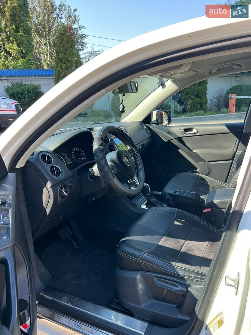 Volkswagen Tiguan 2013 VIN WVGAV3AX0DW567407 фото оголошення 9 з 23