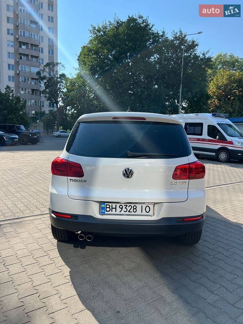 Volkswagen Tiguan 2013 VIN WVGAV3AX0DW567407 фото оголошення 5 з 23