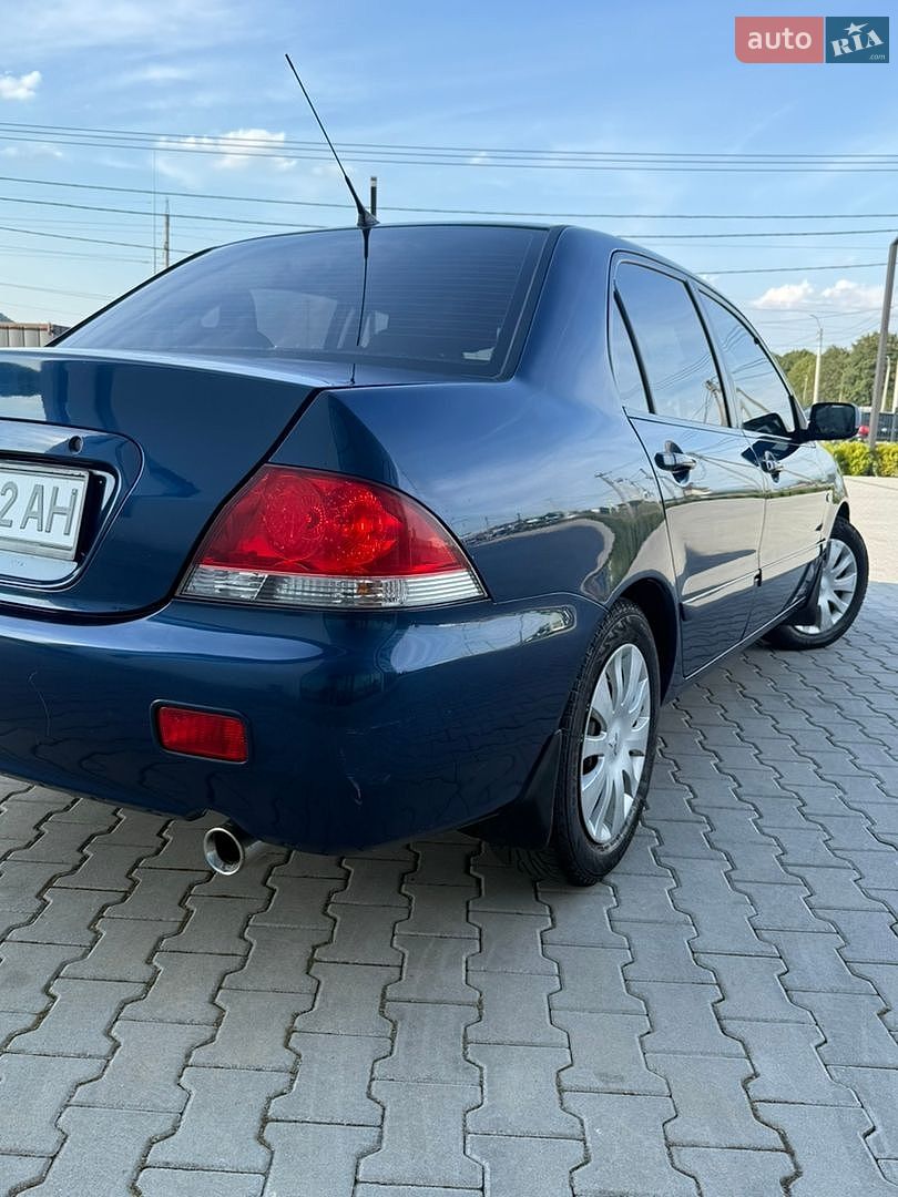 Mitsubishi Lancer 2008 VIN JMBSNCS3A8U003489 фото оголошення 3 з 64