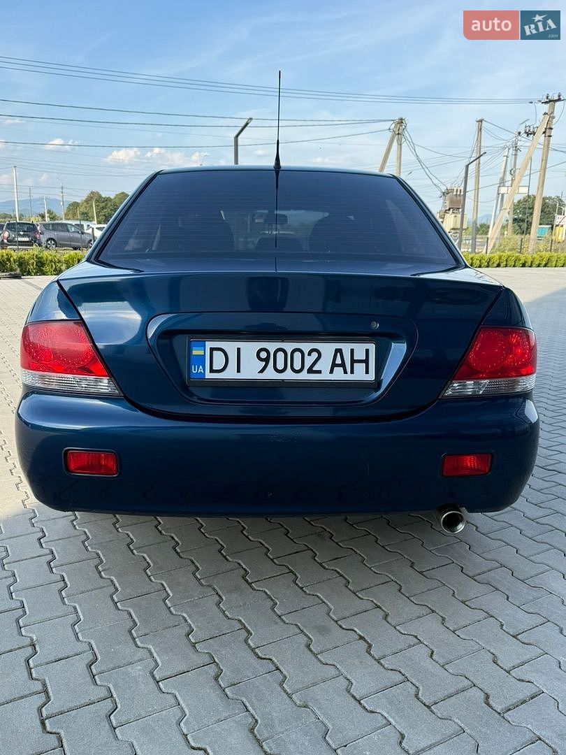Mitsubishi Lancer 2008 VIN JMBSNCS3A8U003489 фото оголошення 4 з 64