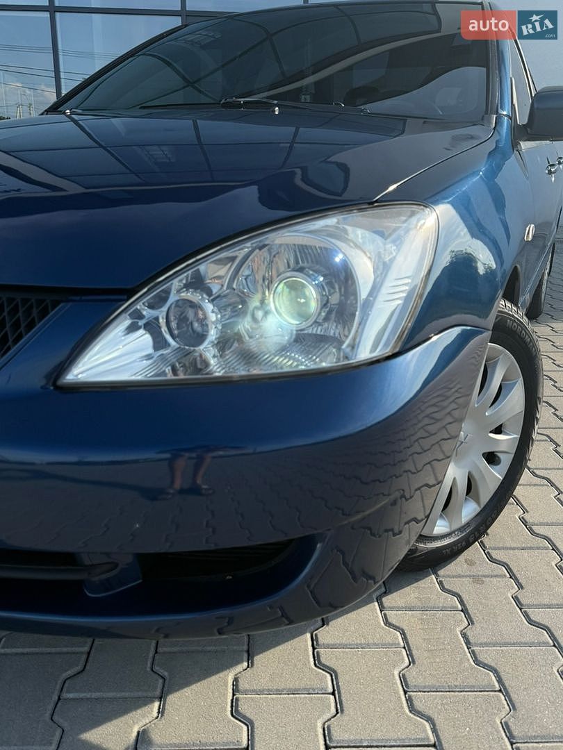 Mitsubishi Lancer 2008 VIN JMBSNCS3A8U003489 фото оголошення 5 з 64