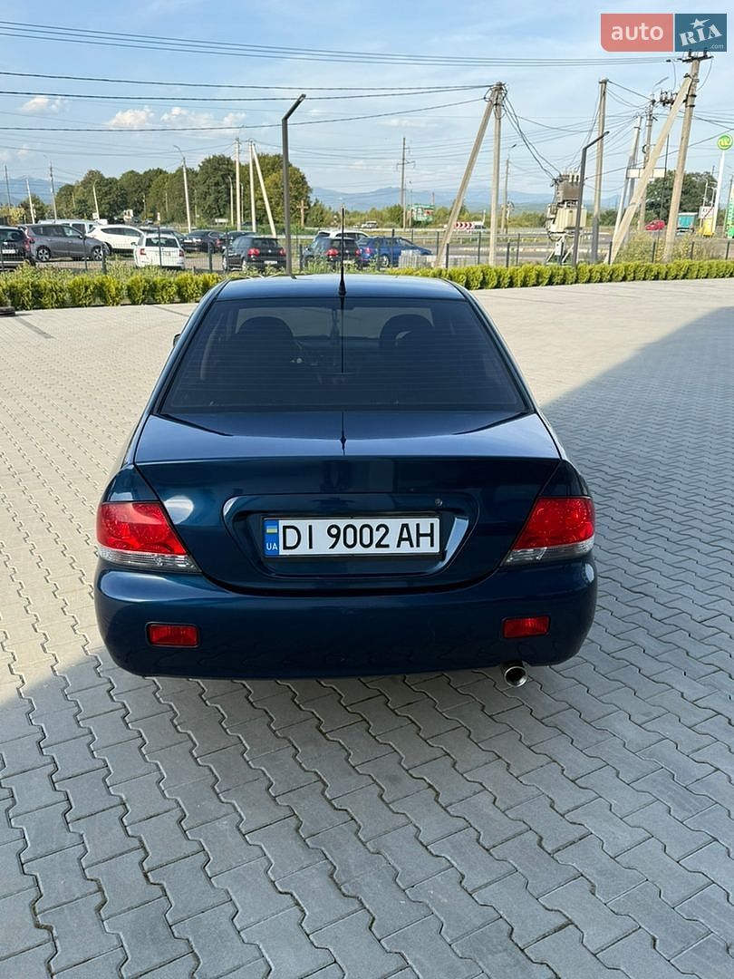 Mitsubishi Lancer 2008 VIN JMBSNCS3A8U003489 фото оголошення 8 з 64