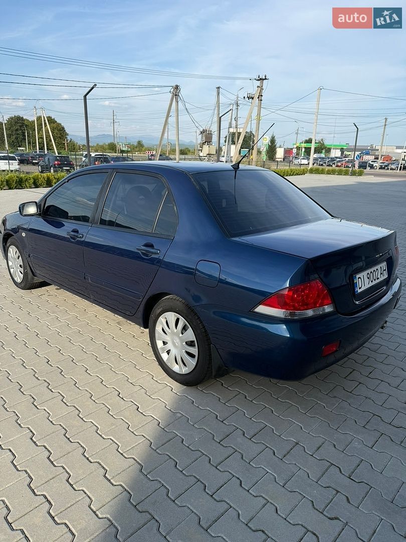 Mitsubishi Lancer 2008 VIN JMBSNCS3A8U003489 фото оголошення 9 з 64