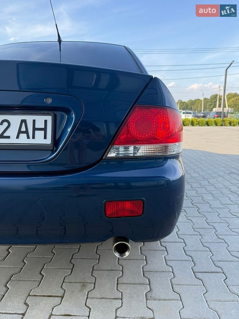 Mitsubishi Lancer 2008 VIN JMBSNCS3A8U003489 фото оголошення 11 з 64