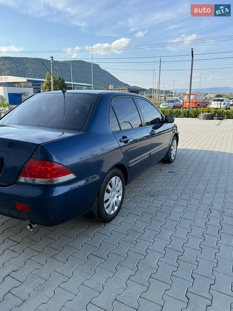 Mitsubishi Lancer 2008 VIN JMBSNCS3A8U003489 фото оголошення 16 з 64
