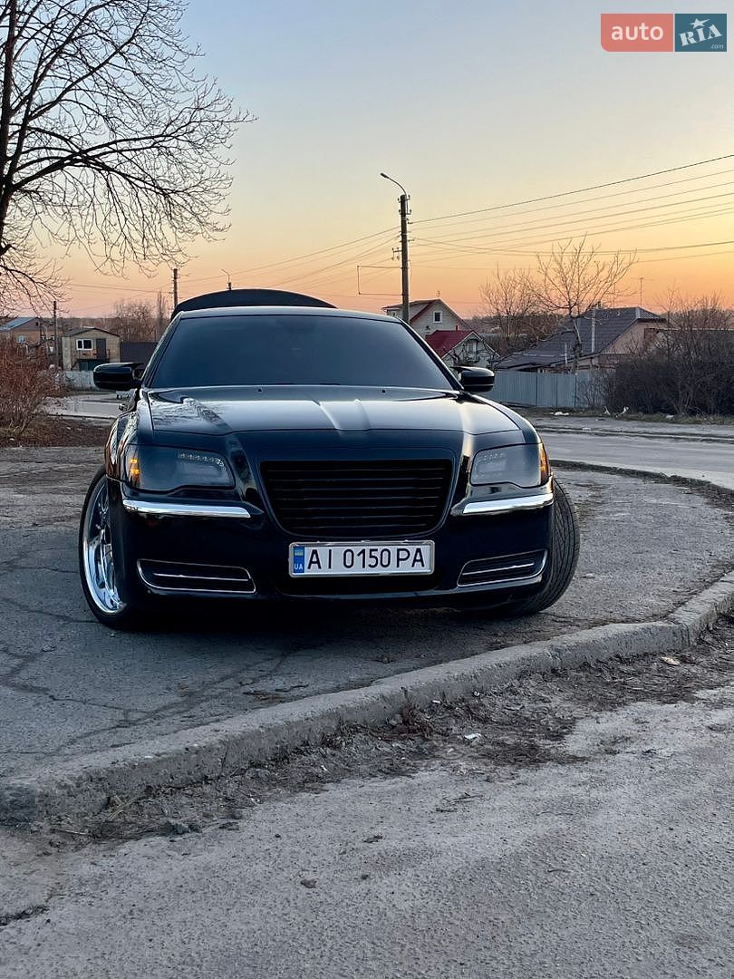 Chrysler 300C 2013 VIN 2C3CCAAG9DH709764 фото оголошення 18 з 26