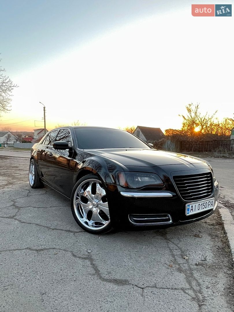 Chrysler 300C 2013 VIN 2C3CCAAG9DH709764 фото оголошення 19 з 26