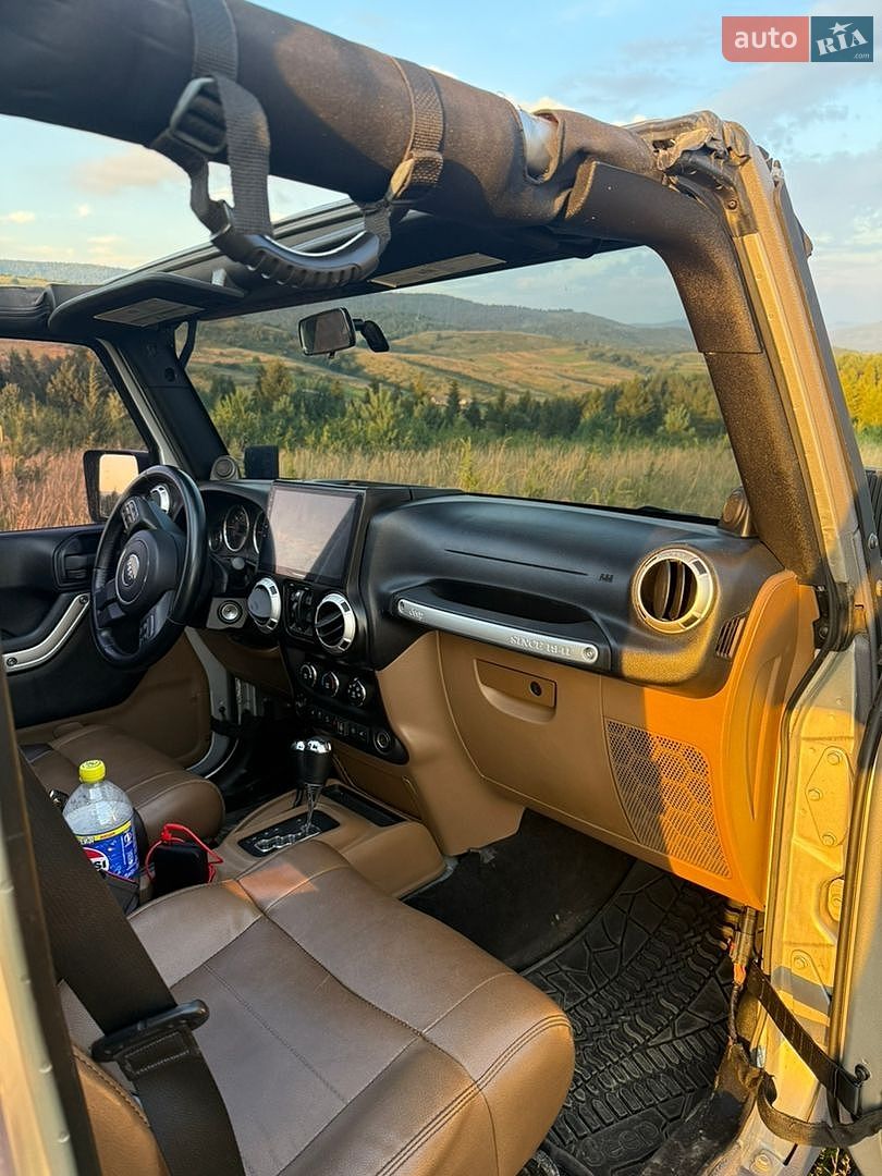 Jeep Wrangler 2011 VIN 1C4HJWFGXCL104263 фото оголошення 15 з 15