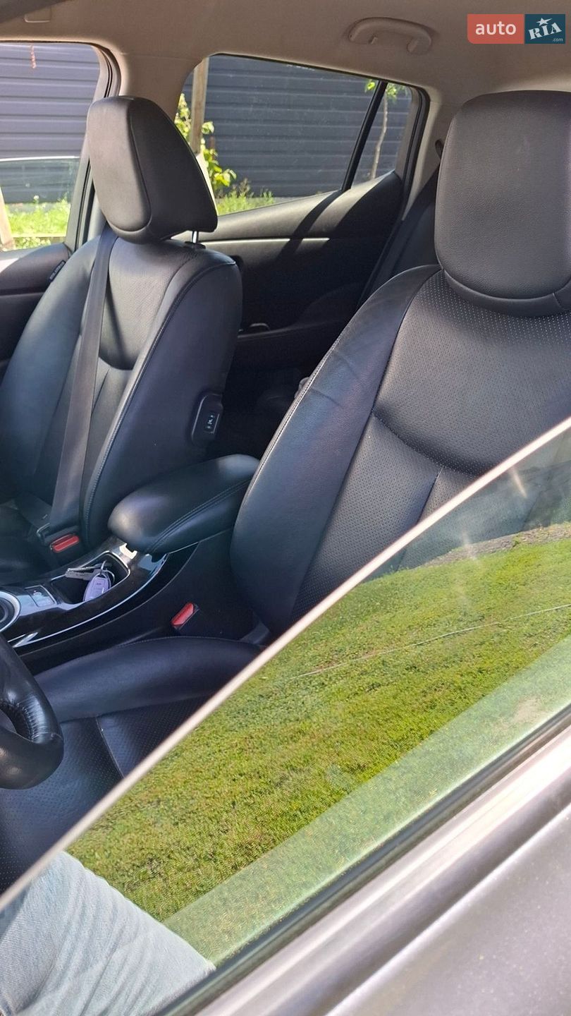 Nissan Leaf 2014 VIN SJNFAAZE0U6021559 фото оголошення 5 з 8
