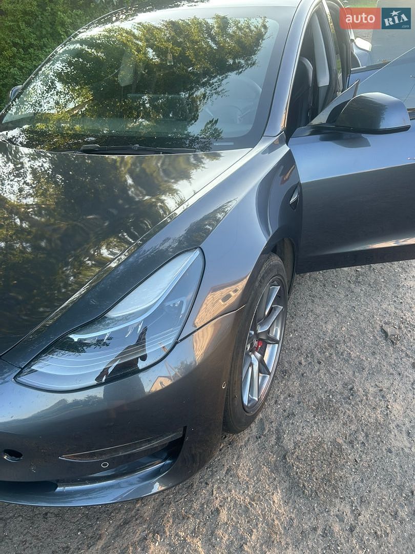Tesla Model 3 2023 VIN 5YJ3E1EB1PF663054 фото оголошення 12 з 26
