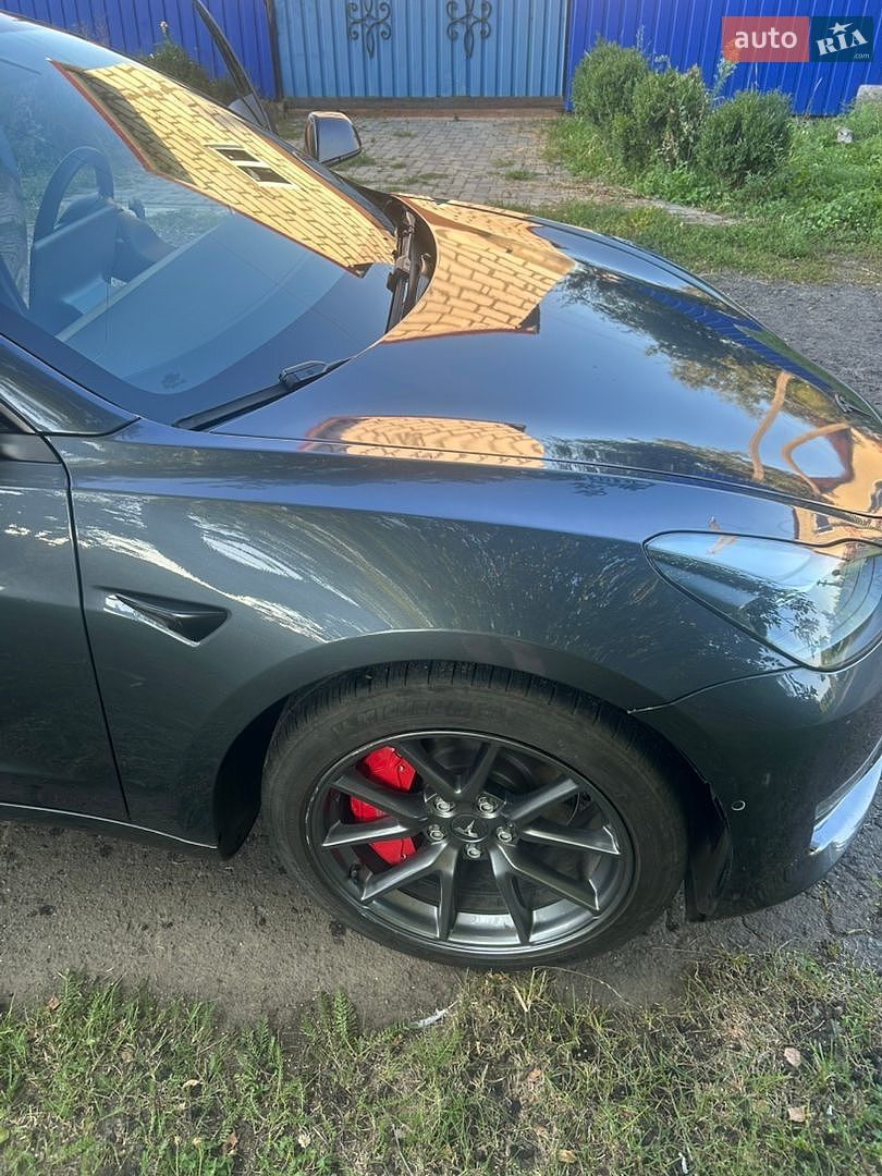Tesla Model 3 2023 VIN 5YJ3E1EB1PF663054 фото оголошення 14 з 26