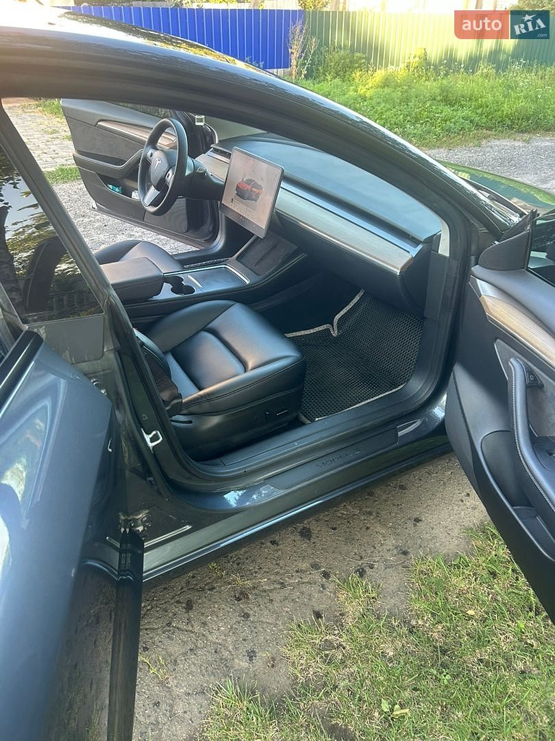 Tesla Model 3 2023 VIN 5YJ3E1EB1PF663054 фото оголошення 17 з 26