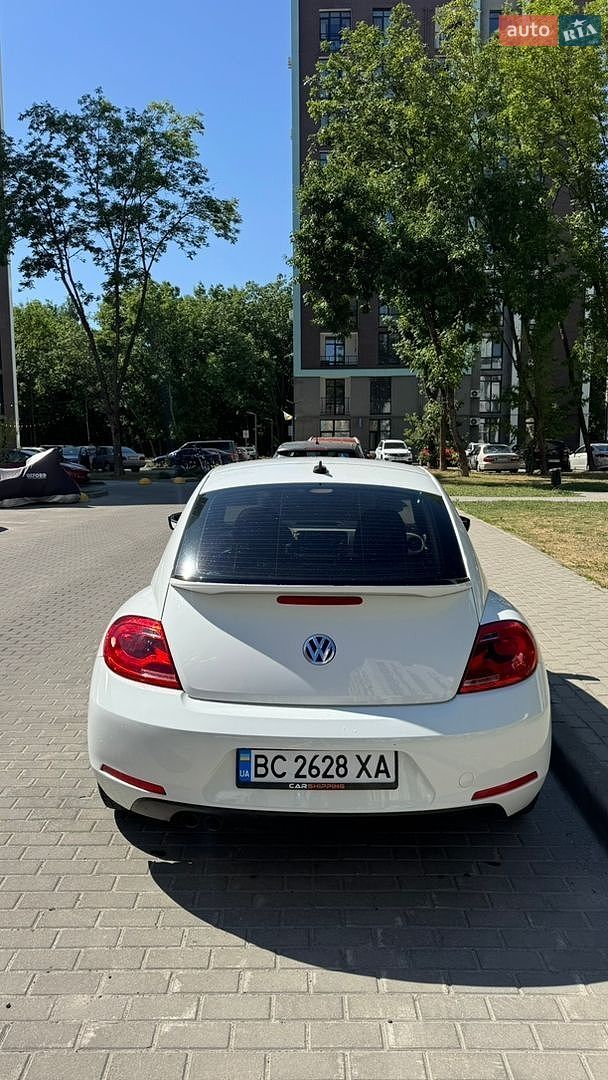 Volkswagen Beetle 2014 VIN 3VWF17ATXFM600701 фото оголошення 2 з 16