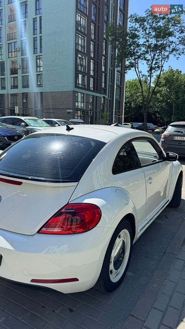 Volkswagen Beetle 2014 VIN 3VWF17ATXFM600701 фото оголошення 9 з 16