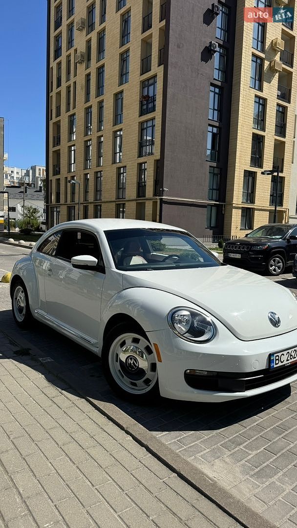 Volkswagen Beetle 2014 VIN 3VWF17ATXFM600701 фото оголошення 11 з 16