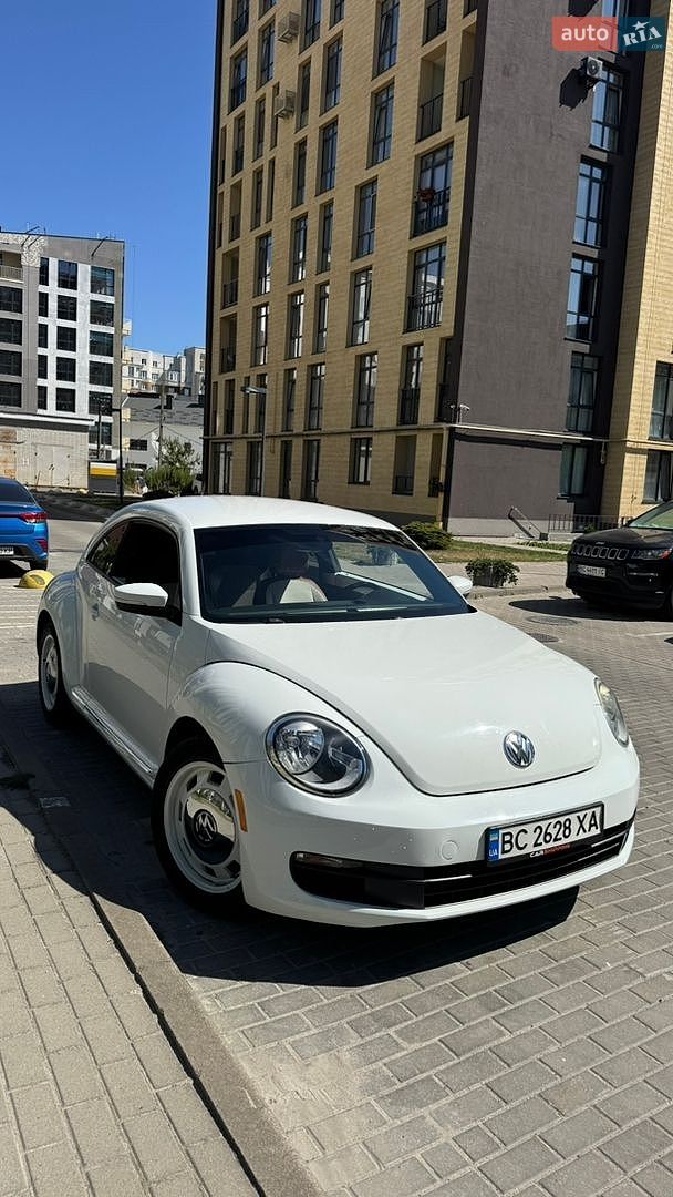 Volkswagen Beetle 2014 VIN 3VWF17ATXFM600701 фото оголошення 10 з 16