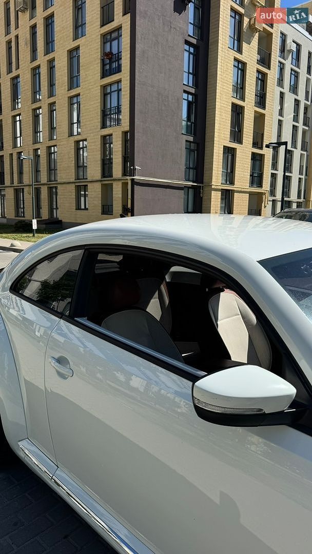 Volkswagen Beetle 2014 VIN 3VWF17ATXFM600701 фото оголошення 12 з 16