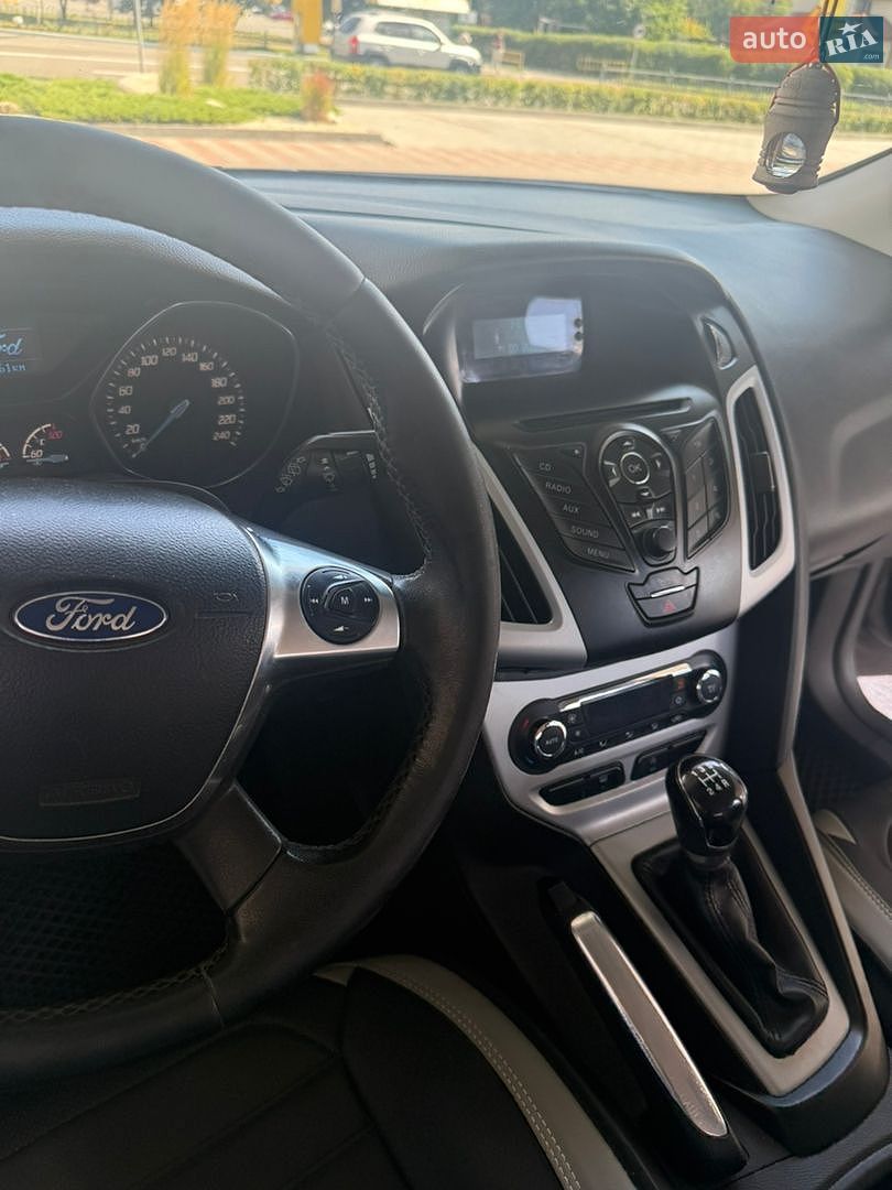 Ford Focus 2013 VIN WF0KXXGCBKDR81391 фото оголошення 12 з 21