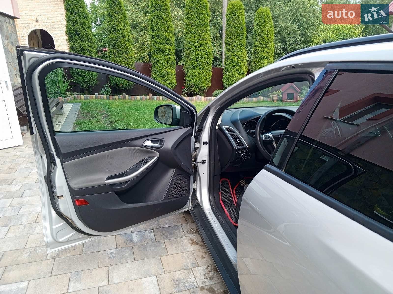 Ford Focus 2013 VIN WF0LXXGCBLDC60348 фото оголошення 8 з 11
