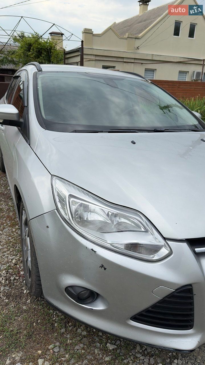Ford Focus 2014 VIN WF0LXXGCBLET42811 фото оголошення 6 з 8
