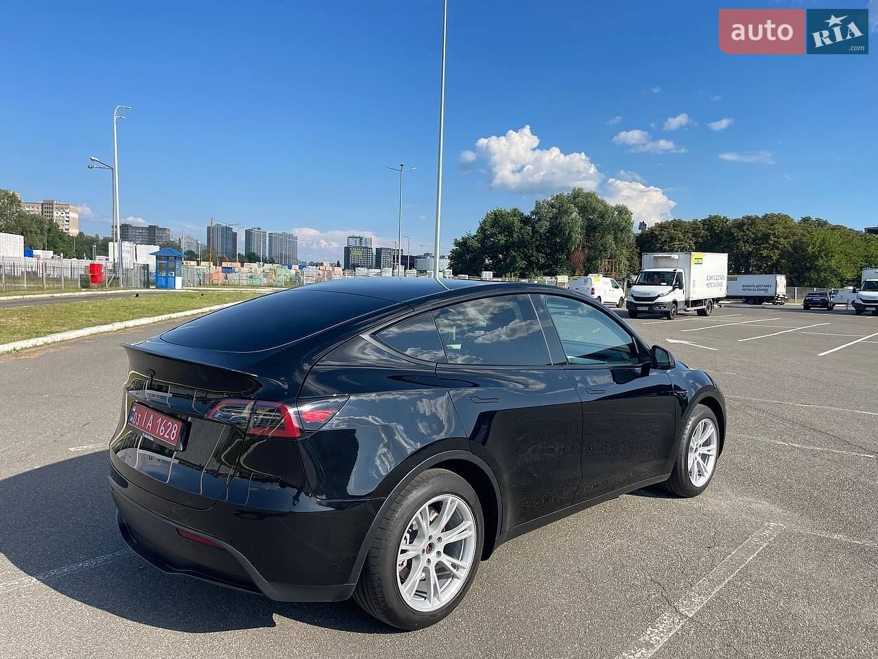 Tesla Model Y 2023 VIN XP7YGCEK0PB149934 фото оголошення 5 з 14