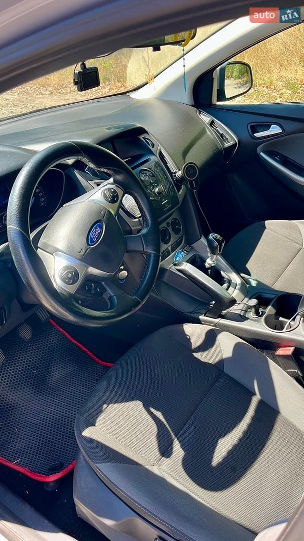 Ford Focus 2012 VIN WF0LXXGCBLCT24043 фото оголошення 8 з 12
