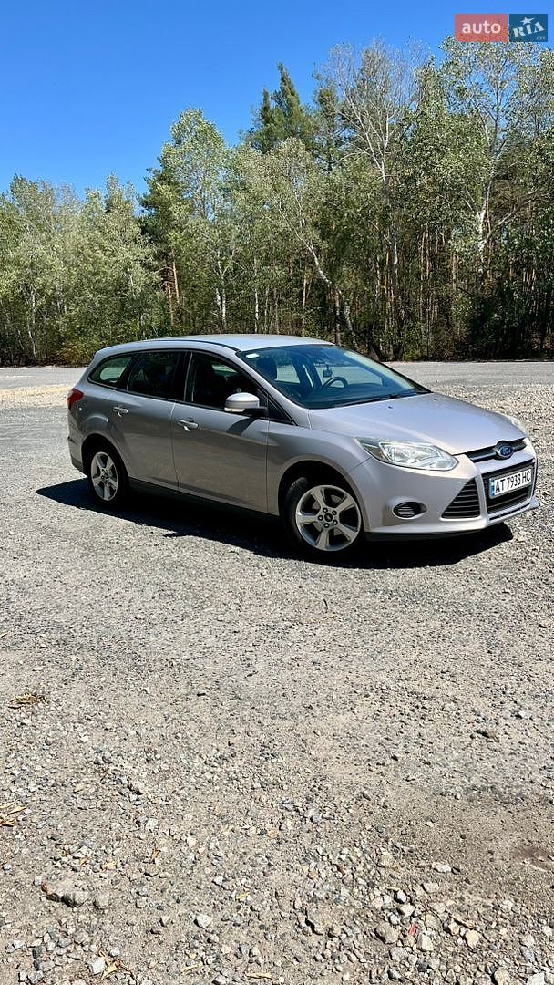 Ford Focus 2012 VIN WF0LXXGCBLCT24043 фото оголошення 5 з 12
