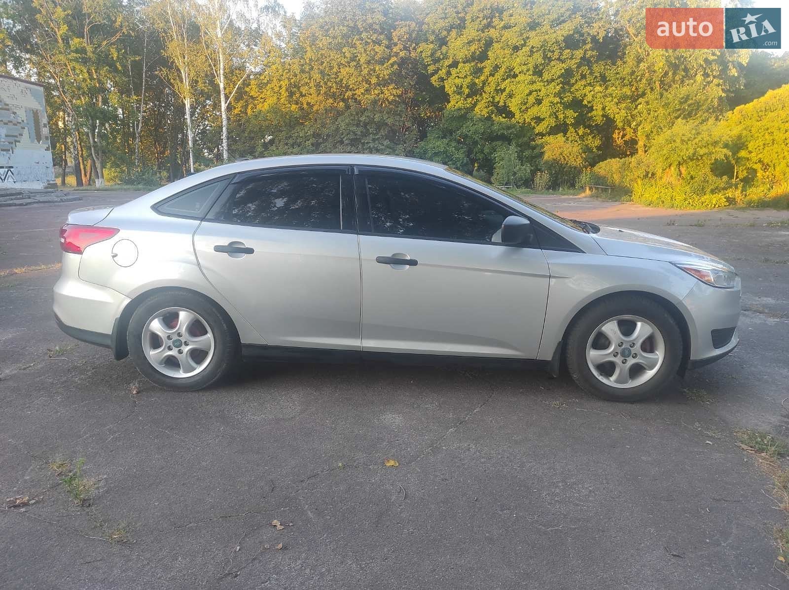 Ford Focus 2016 VIN 1FADP3E23GL305547 фото оголошення 3 з 10