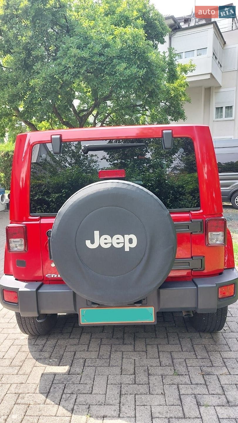 Jeep Wrangler 2014 VIN 1C4HJWB52EL211590 фото оголошення 3 з 8