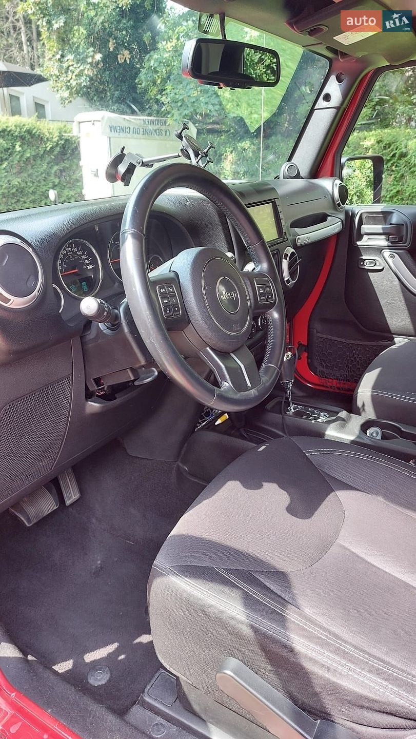 Jeep Wrangler 2014 VIN 1C4HJWB52EL211590 фото оголошення 7 з 8