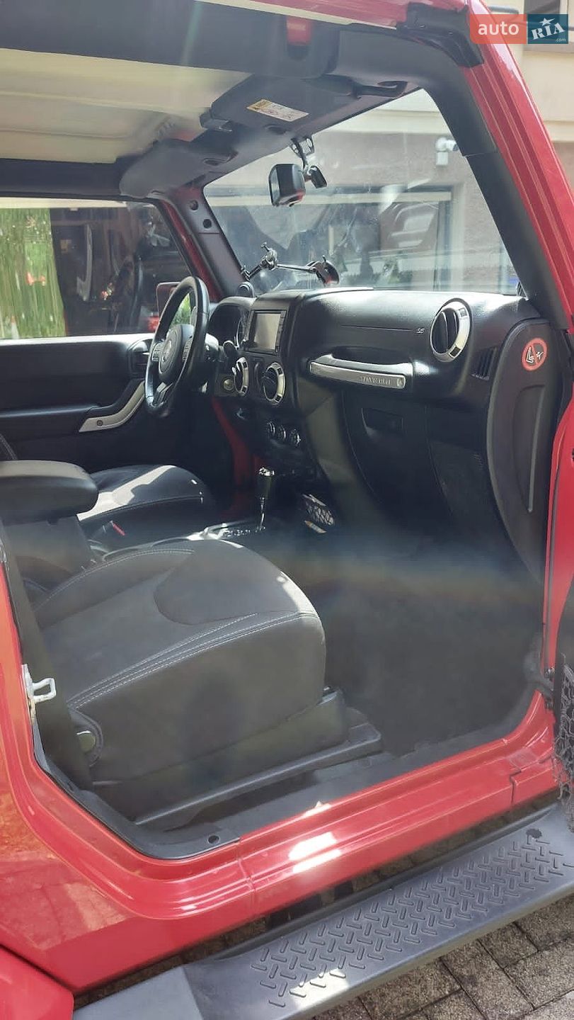 Jeep Wrangler 2014 VIN 1C4HJWB52EL211590 фото оголошення 8 з 8