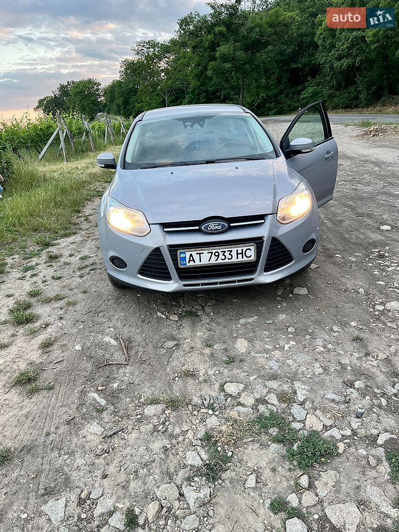 Ford Focus 2012 VIN WF0LXXGCBLCT24043 фото оголошення 3 з 12