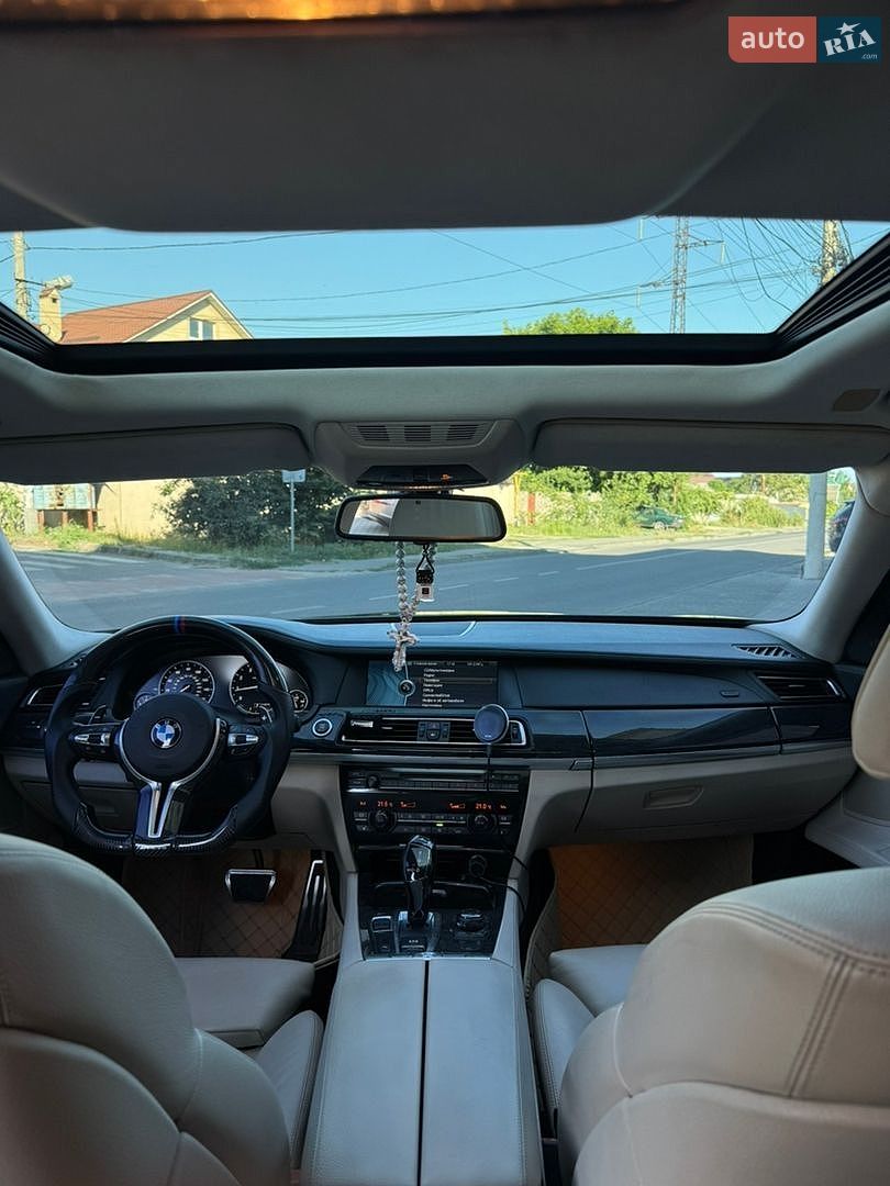 BMW 7 Series 2011 VIN WBAKB4C50BC574839 фото оголошення 7 з 21