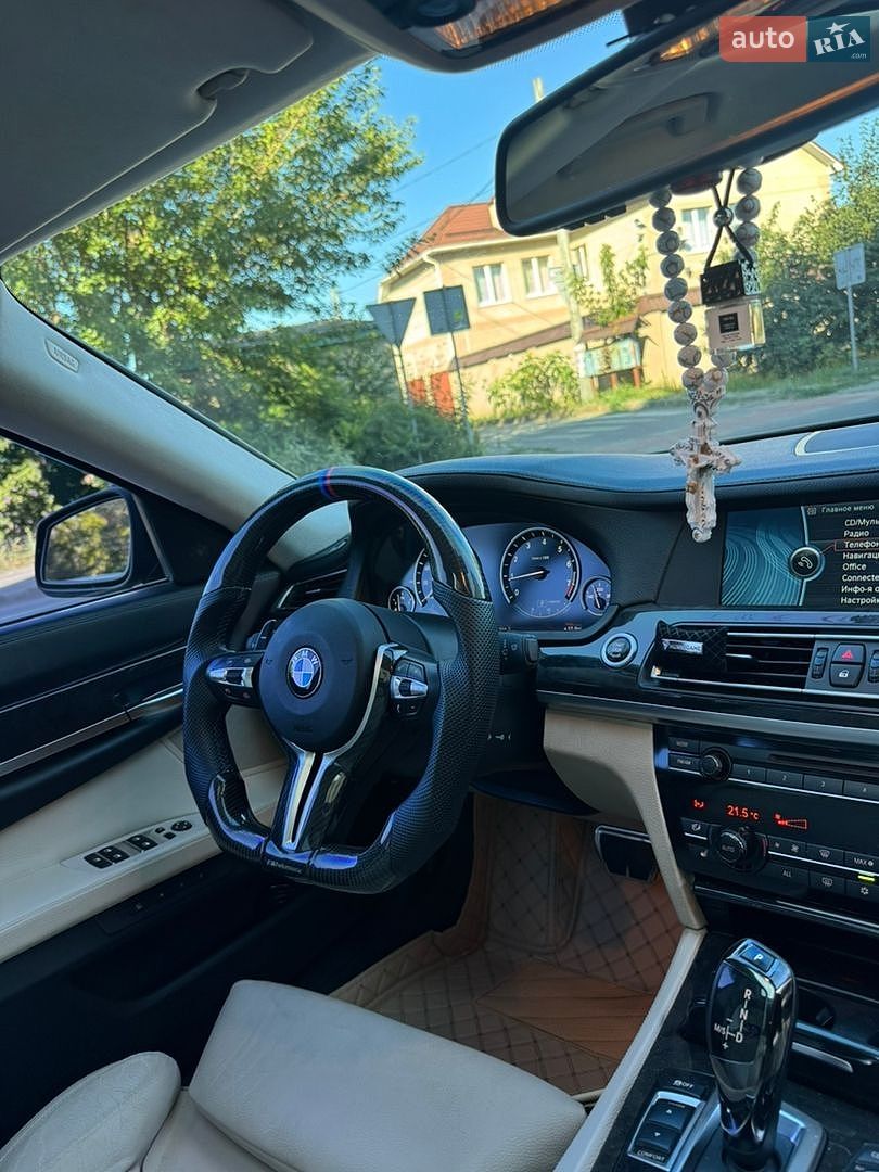 BMW 7 Series 2011 VIN WBAKB4C50BC574839 фото оголошення 9 з 21