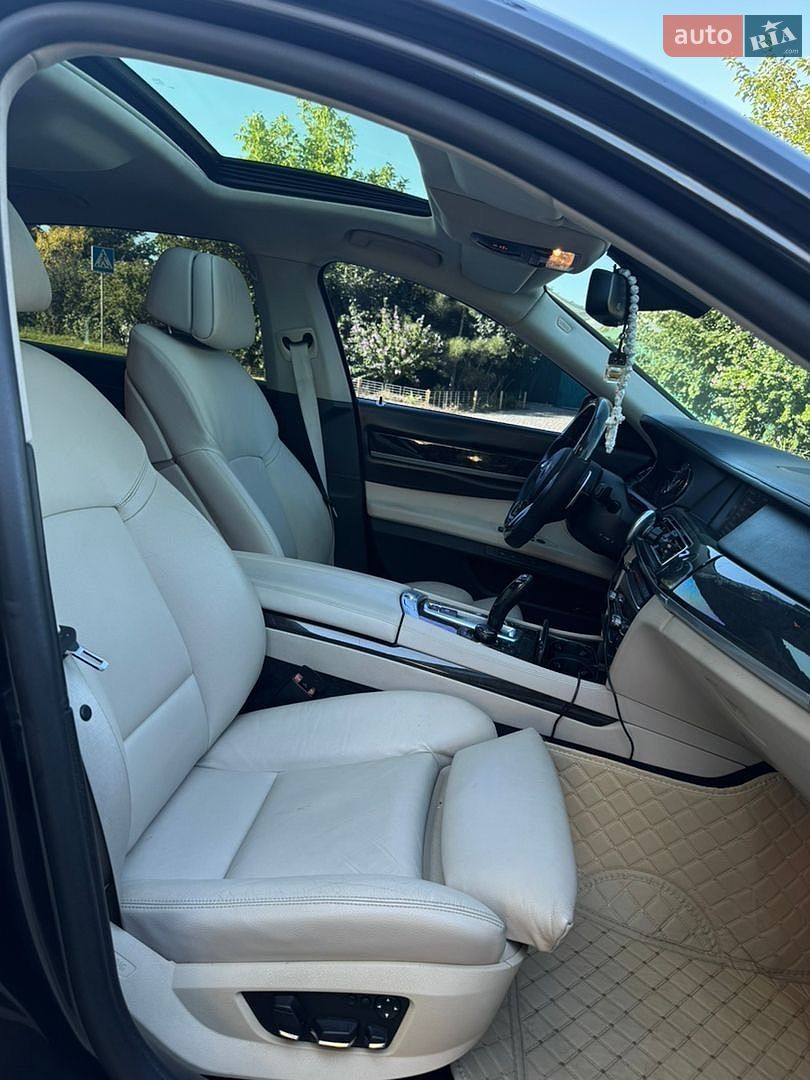 BMW 7 Series 2011 VIN WBAKB4C50BC574839 фото оголошення 19 з 21