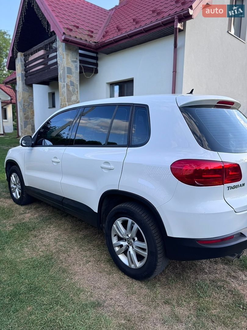 Volkswagen Tiguan 2012 VIN WVGAV7AX1CW611064 фото оголошення 8 з 23