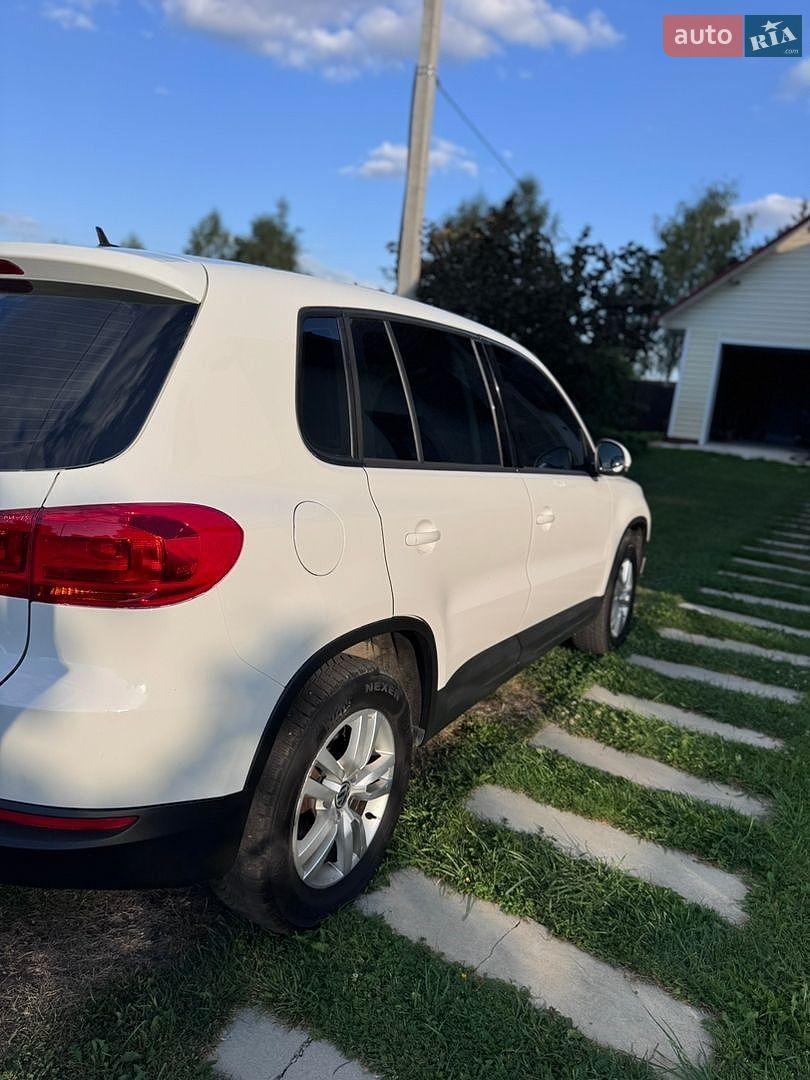 Volkswagen Tiguan 2012 VIN WVGAV7AX1CW611064 фото оголошення 10 з 23