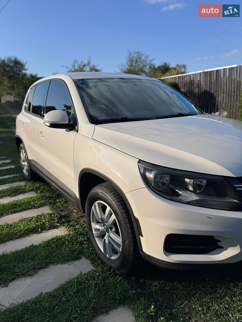 Volkswagen Tiguan 2012 VIN WVGAV7AX1CW611064 фото оголошення 12 з 23