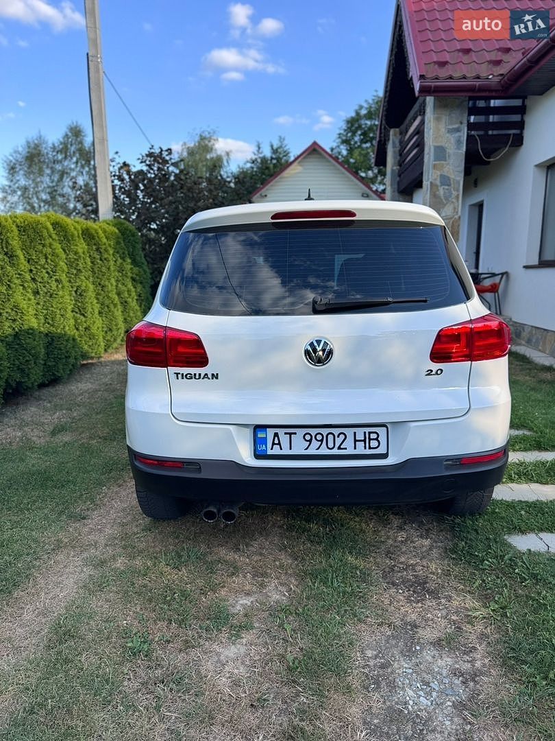Volkswagen Tiguan 2012 VIN WVGAV7AX1CW611064 фото оголошення 9 з 23