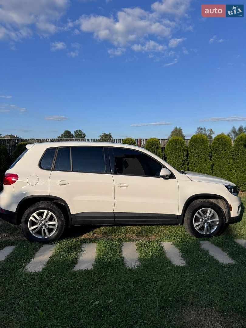 Volkswagen Tiguan 2012 VIN WVGAV7AX1CW611064 фото оголошення 11 з 23