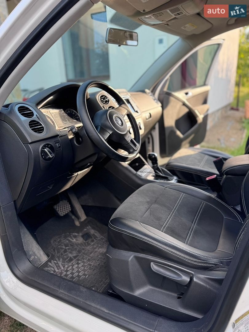 Volkswagen Tiguan 2012 VIN WVGAV7AX1CW611064 фото оголошення 17 з 23
