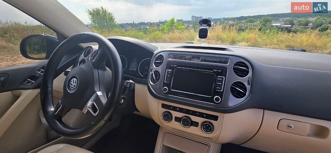 Volkswagen Tiguan 2013 VIN WVGBV3AX9DW079089 фото оголошення 14 з 35