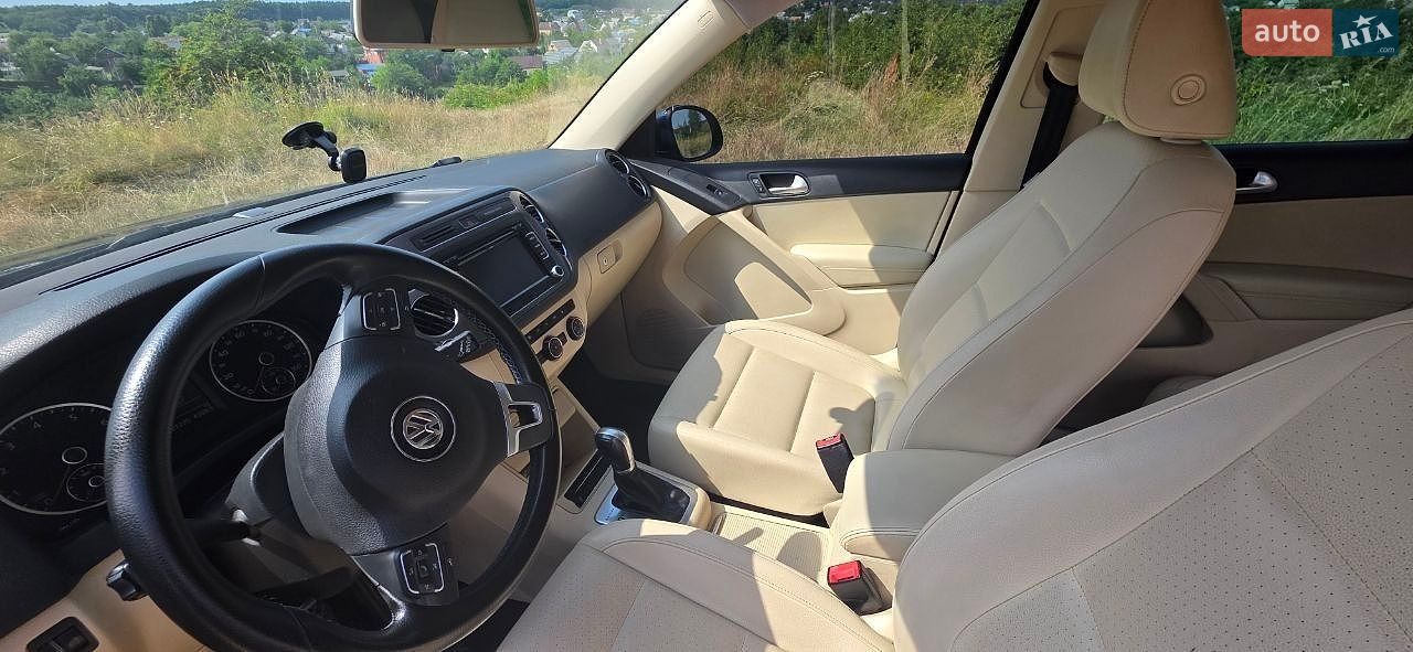 Volkswagen Tiguan 2013 VIN WVGBV3AX9DW079089 фото оголошення 27 з 35