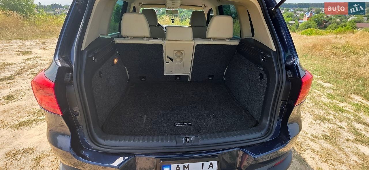 Volkswagen Tiguan 2013 VIN WVGBV3AX9DW079089 фото оголошення 28 з 35