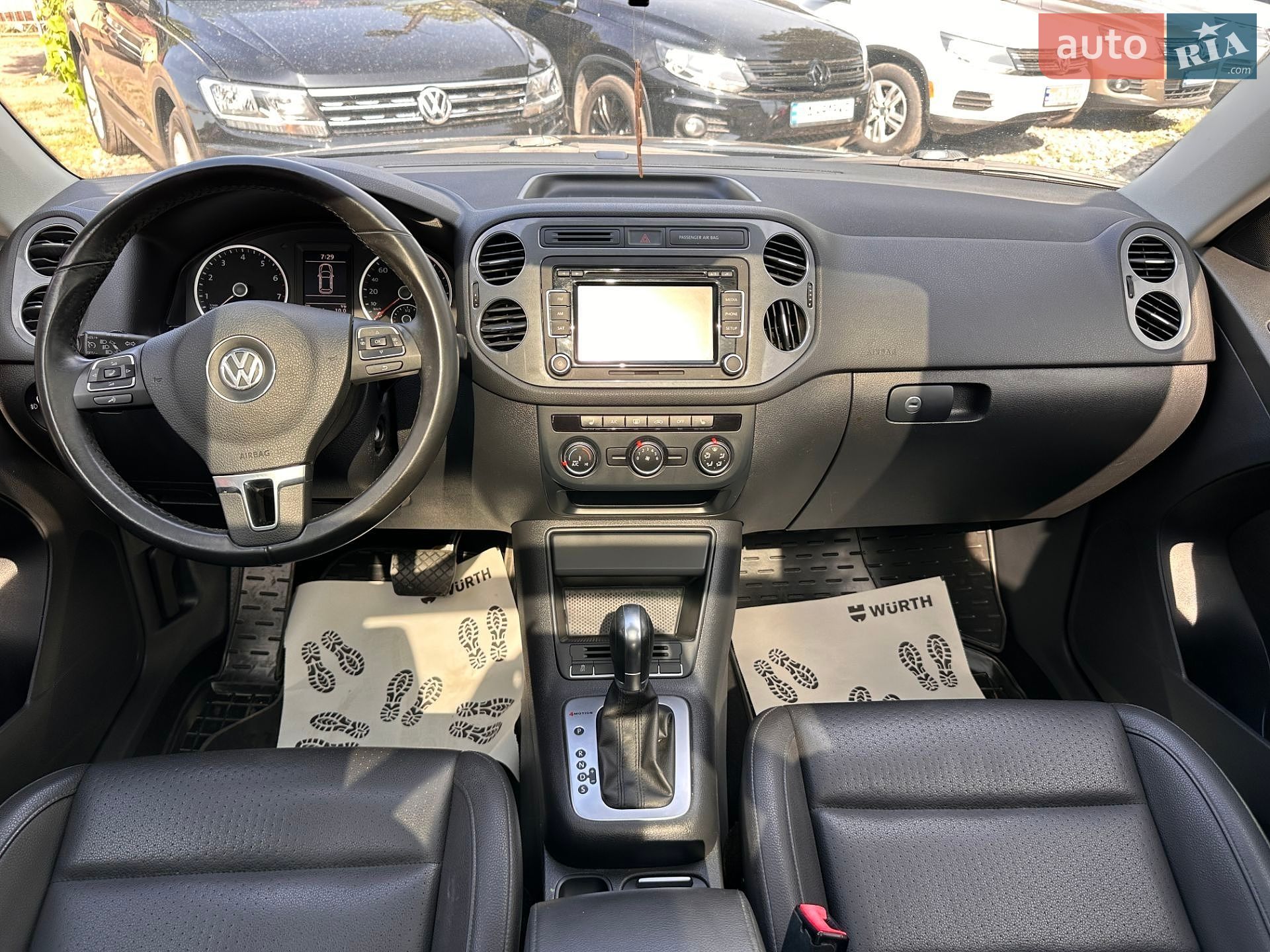 Volkswagen Tiguan 2014 VIN WVGJV3AXXEW621460 фото оголошення 4 з 21