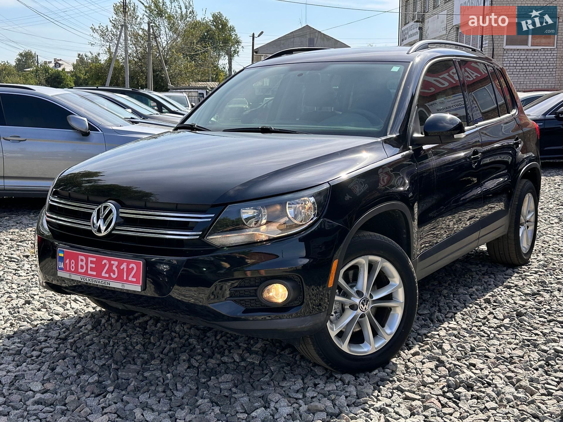 Volkswagen Tiguan 2014 VIN WVGJV3AXXEW621460 фото оголошення 2 з 21